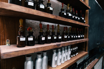 Chemical worker, Chemistry, Experiment, Vials. Close up amber color bottles on the shelf in old...