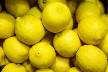 yellow lemon on woonden box sale in fresh market