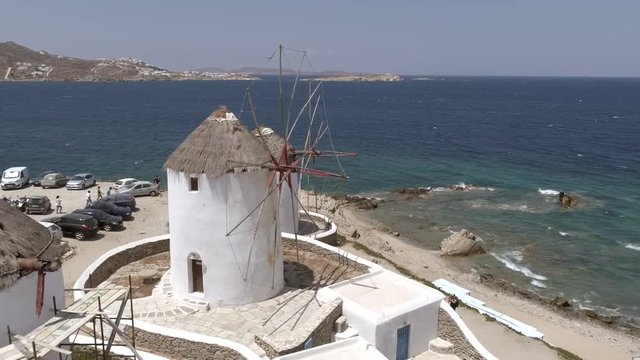 Aerial view of traditional windmill near the coast, Greece.