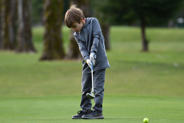 Junior Golfer Putting
