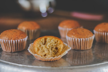Bakery fresh banana cup cake hot from oven , home made food.