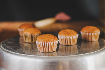 Bakery fresh banana cup cake hot from oven , home made food.