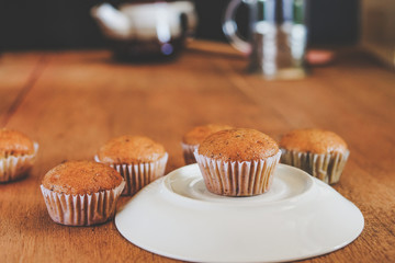 Bakery fresh banana cup cake hot from oven , home made food.