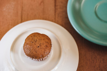 Bakery fresh banana cup cake hot from oven , home made food.