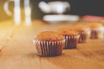 Bakery fresh banana cup cake hot from oven , home made food.