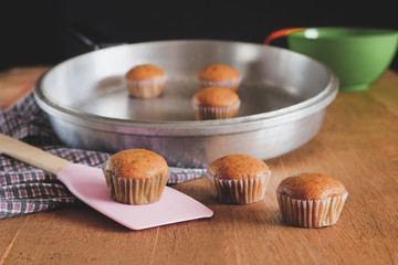 Bakery fresh banana cup cake hot from oven , home made food.