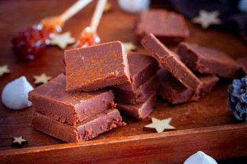 Homemade chocolate, sliced with a cup of coffee, top view, horizontal