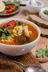 Thick red soup with pasta