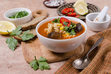 Thick red soup with pasta