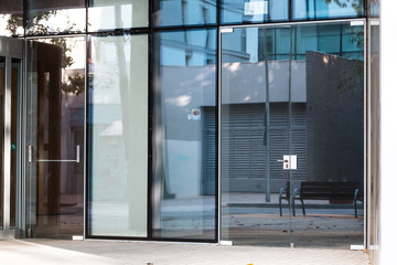 Modern glass entrance of an office building