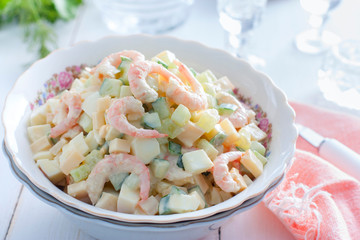 Salad with shrimps, cucumber, eggs and cheese, horizontal