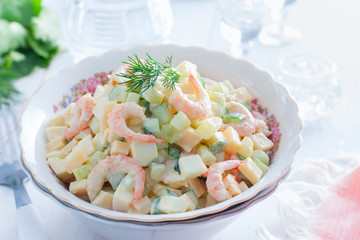Salad with shrimps, cucumber, eggs and cheese, horizontal