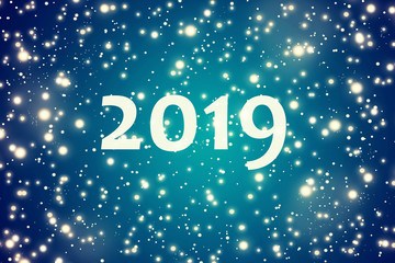 2019. Winter blue background with the falling snow flakes.