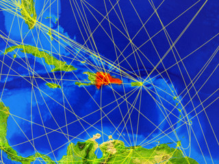 Dominican Republic from space on model of planet Earth with networks. Detailed planet surface with city lights.