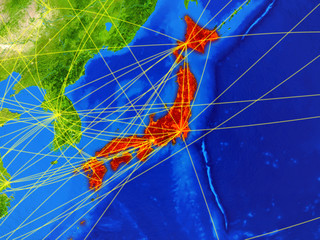 Japan from space on model of planet Earth with networks. Detailed planet surface with city lights.