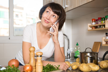 Housewife talking on mobile phone