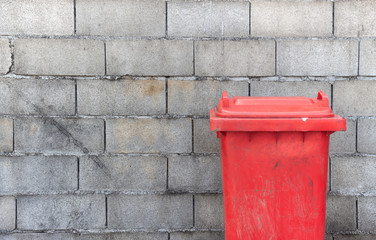 closeup dangerous trash bin with soft-focus and over light in the background