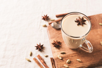 Obraz na płótnie Canvas Mug of spice latter tea or coffee, winter and autumn hot drink
