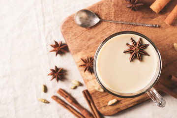 Mug of spice latter tea or coffee, winter and autumn hot drink