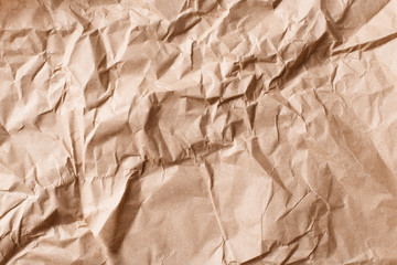 Wrinkled and crumpled kraft grey old paper, texture and background