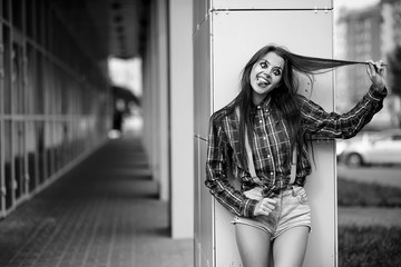 Girl in a clown makeup black and white