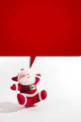 Santa claus doll isolated white background.copy space.With top large white square text box.