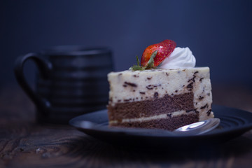 Coffee and chocolate and cheese cake on distressed wood background