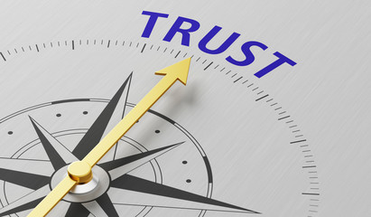 Compass needle pointing to the word Trust