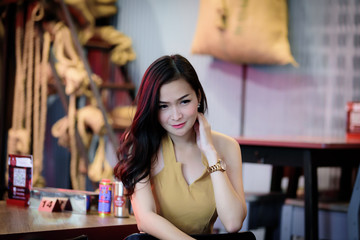 Asian pretty and sexy portrait girl has relaxing at coffee cafe restaurant.