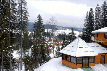 mountains and houses in the snow