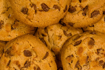 Pile of the fresh chocolate chip cookies for background