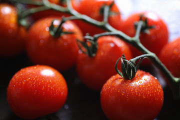 Branch with fresh cherry tomatoes. Ripe red tomatoes. Tomatoes and pasta with spices.