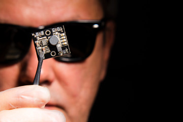A man in black glasses