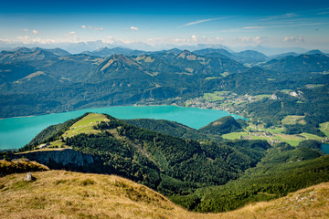 Fototapeta na wymiar Scenic view from Schafberg over Lake Wolfgang and the mountains of Salzkammergut