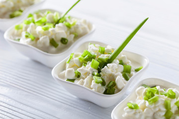 Cottage cheese with green onions.