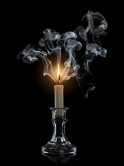 Burning candle in smoke clubs