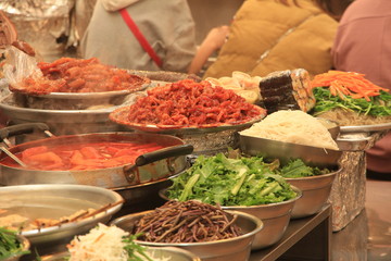 Korean Street Food inside Gwangjang Market in Seoul, South Korea