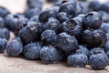 fresh picked lueberries on wooden background