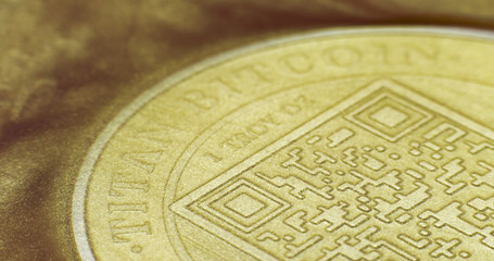 Crypto currency Gold Bitcoin - BTC - Bit Coin in gold paints.  Macro.
