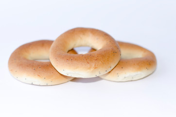 three bagels on white background