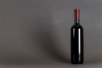 bottle of wine on black background