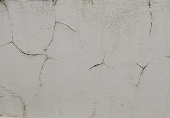 Old white wall with stained water.