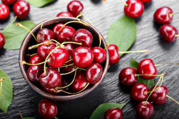 sweet cherries in a clay plate