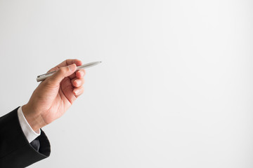 Businessman holding pen