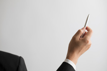 Businessman holding pen