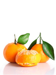 collection of mandarin peel and whole clementine or tangerine. concept of cleaning peel citrus