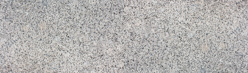 Grey Granite Texture Close Up View with Pale White Color Mineral Stone. Simple Stone Surface of Natural Granite Material Background. Abstract Empty Seamless Rock Backdrop Top View 