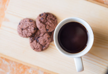 coffee cup on wooden table background