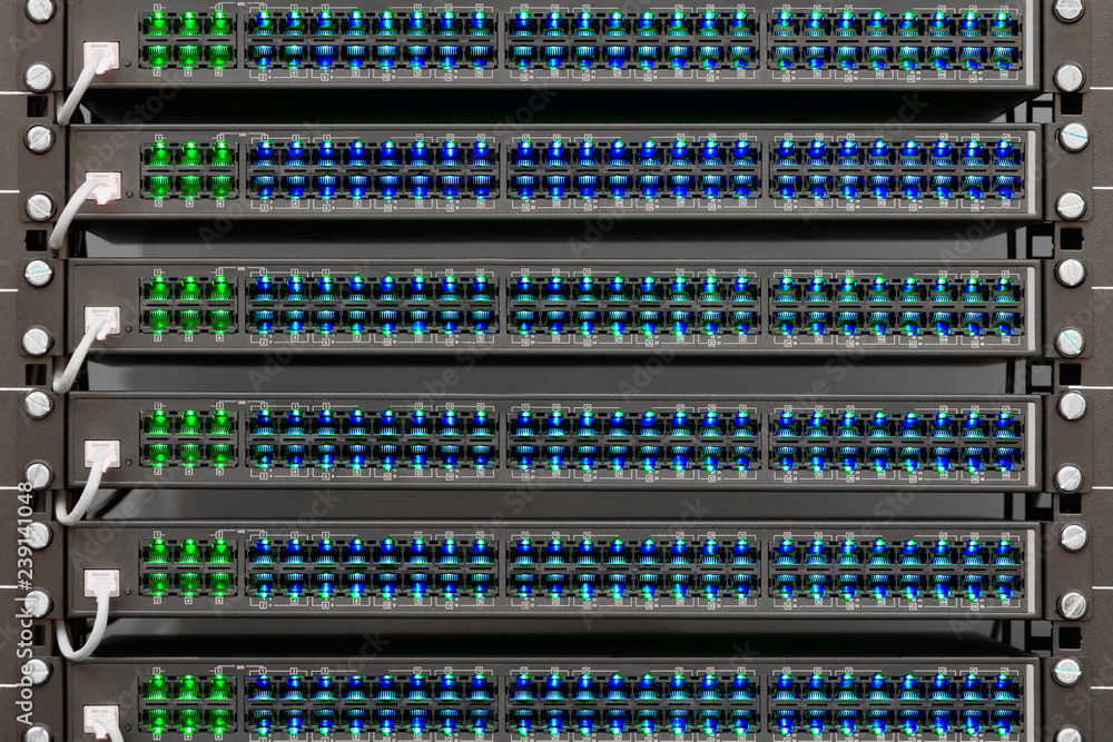 Poster Network routers of ISP. Many wires connect to the network interfaces of powerful Internet servers. Racks with computer equipment in the server room data center.