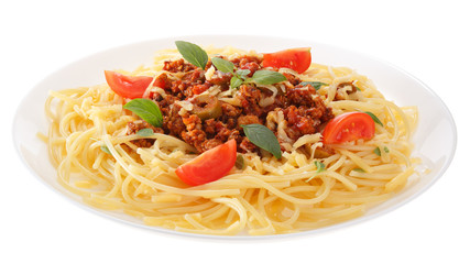 Spaghetti with minced meat, olives, tomatoes and basil served on a plate. Isolated on white background.